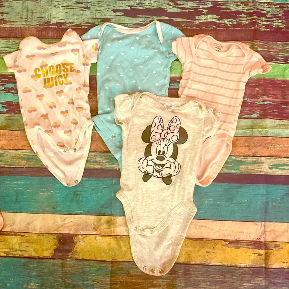 Four shirts 0-3 months